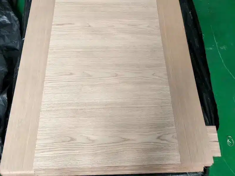 Customized veneer sheet with light wood grain and bordered edge design